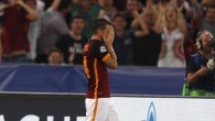 Roma's Alessandro Florenzi covers his face as he celebrates after scoring during a Champions League, Group E soccer match between Roma and Barcelona, at Rome's Olympic stadium Wednesday, Sept. 16, 2015. (AP Photo/Riccardo De Luca)