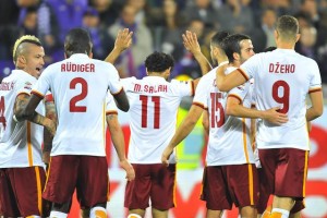 Roma's Mohamed Salah jubilates with teammates after scoring the goal of 0-1 during the italian serie A soccer match ACF Fiorentina vs AS Roma at Artemio Franchi stadium in Florence, Italy, 25 October 2015. ANSA/ MAURIZIO DEGL'INNOCENTI